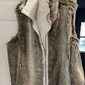 Used White reversible vest very soft inside and out